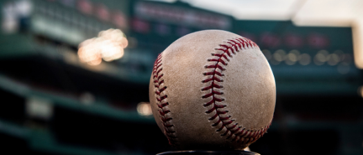 Baseball on the field within Fenway Park